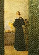 Anna Ancher en ung pige ordner blomster Spain oil painting artist